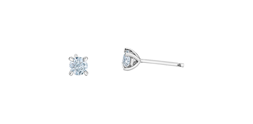 One pair of 14K white gold four claw lab grown diamond stud earrings.